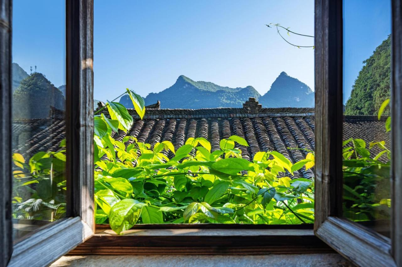 Гостевой дом Yangshuo Secret Garden Экстерьер фото